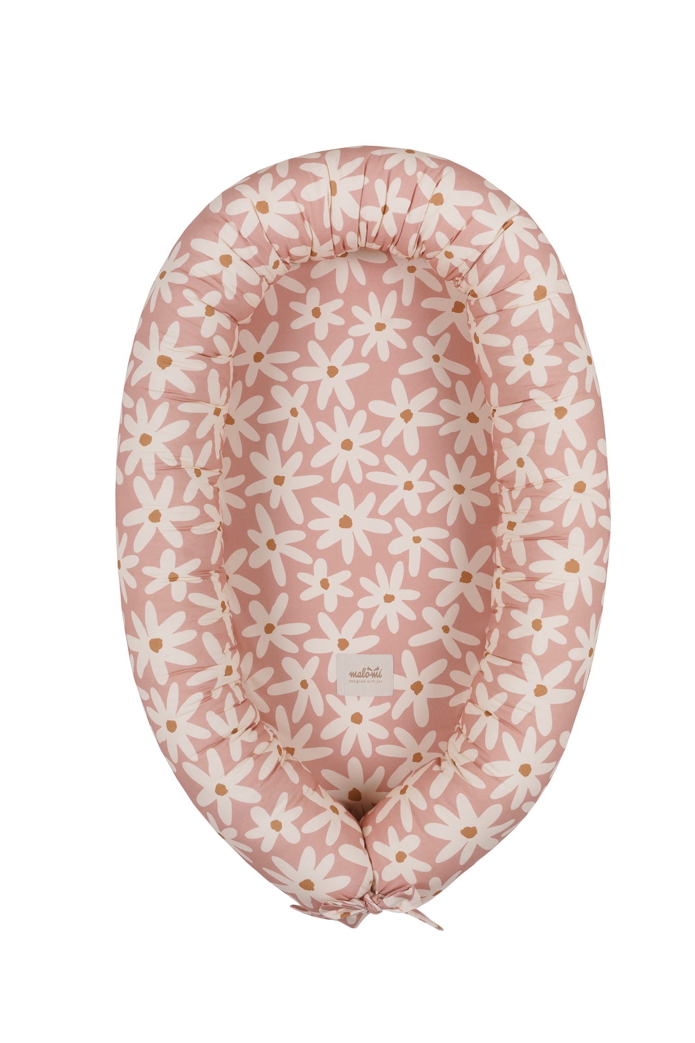 Babynest van Malomi in roze kleur met bloemenprint, bovenaanzicht.